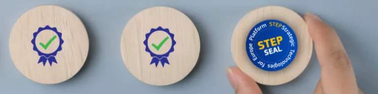 Three wooden discs, two with checkmark badges and one labeled “STEP Seal,” held by a hand.
